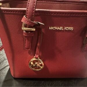 Michael Kors Burgundy Shoulder Bag with matching double zipper wallet